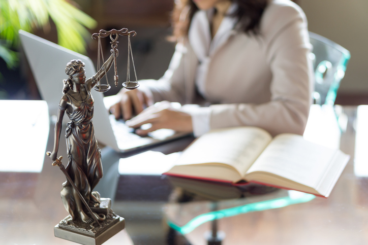 woman lawyer sitting at desk
